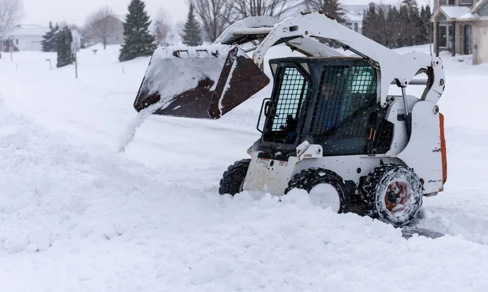 Understanding the Difference Between Snow Plowing and Snow Removal