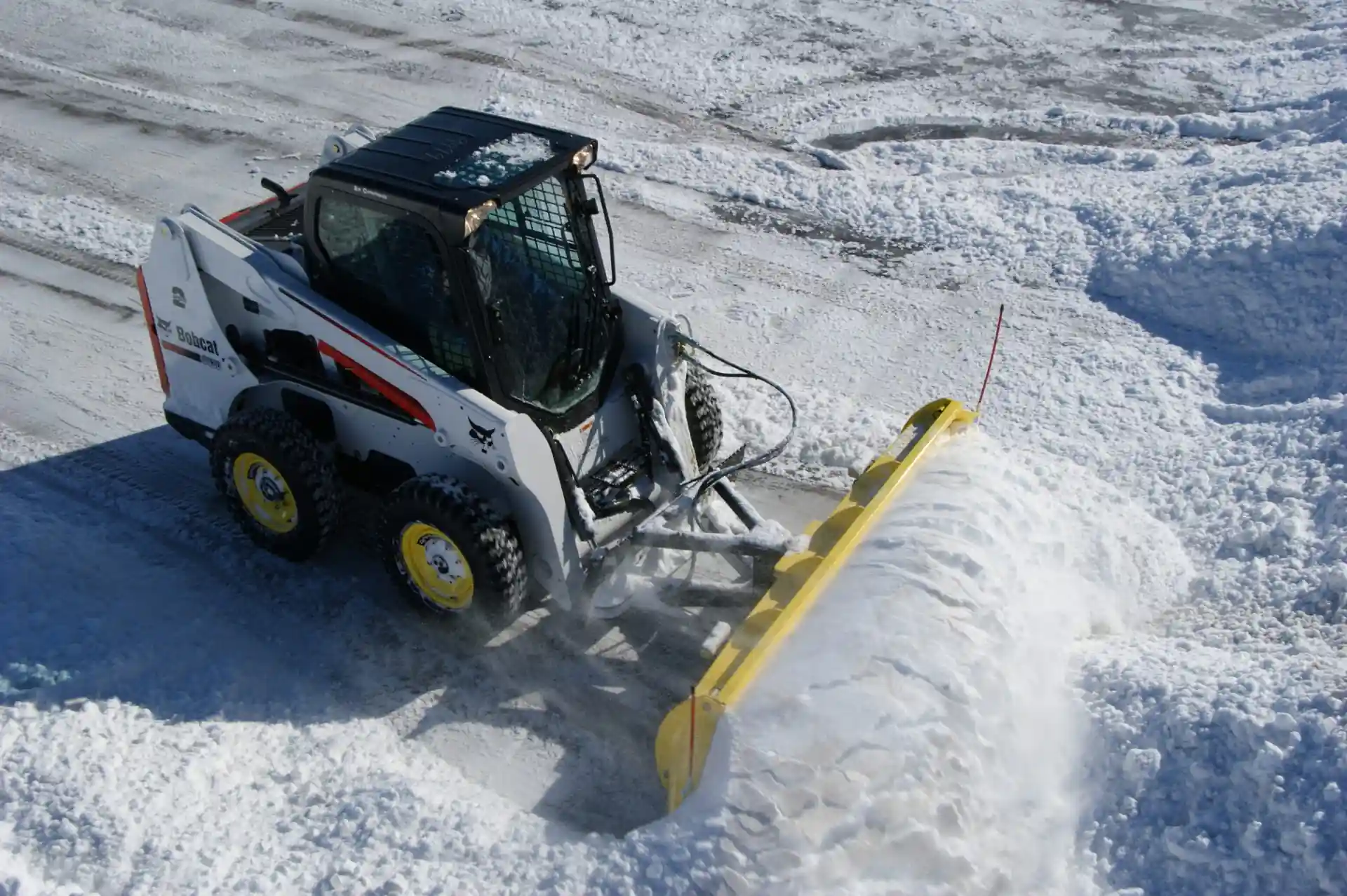 difference between snow plowing and snow removal