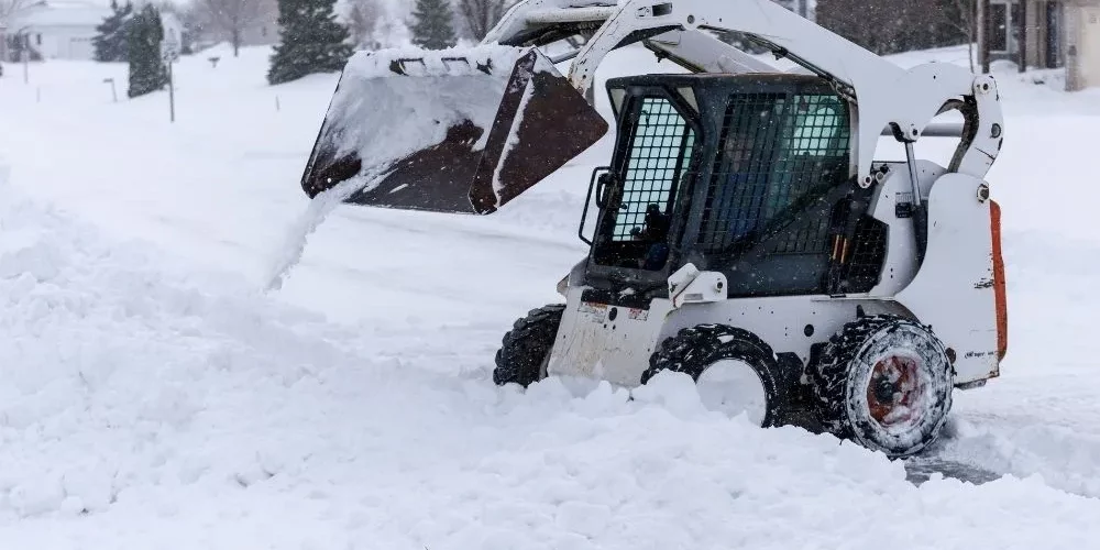 Understanding the Difference Between Snow Plowing and Snow Removal